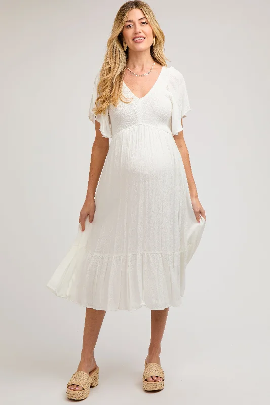 Maternity dress for a baby's first visit to the puppet show Ivory Smocked Ruffle Maternity Dress Maternity dress for a baby's first visit to the puppet show Ivory Smocked Ruffle Maternity Dress