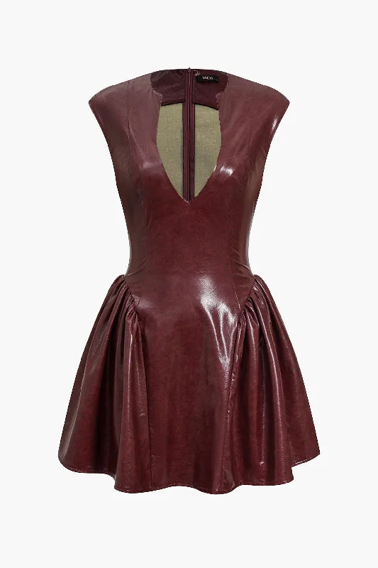 Mini dresses with patchwork designs for a unique style Faux Leather V-neck Ruched Mini Dress