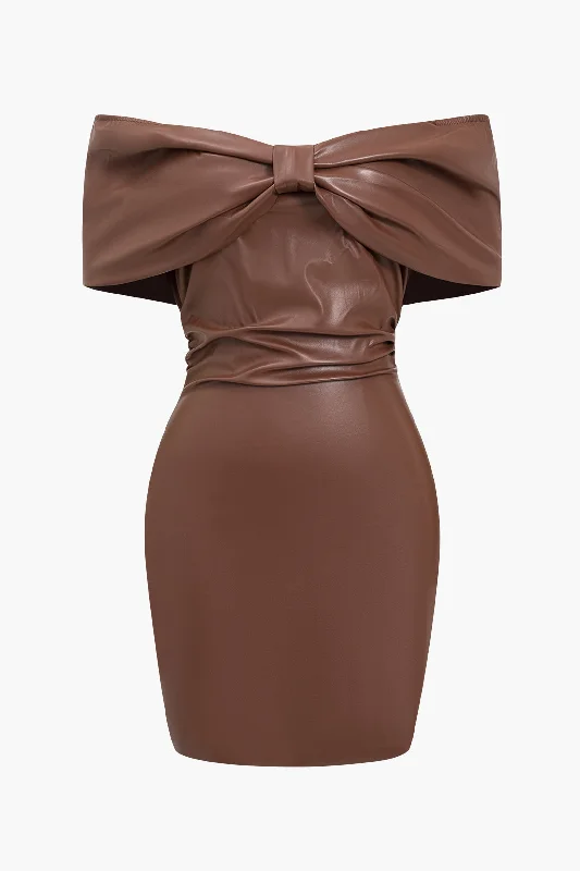 Mini dresses with tassel accents for a fun touch Solid Bow Faux Leather Off Shoulder Mini Dress Mini dresses with tassel accents for a fun touch Solid Bow Faux Leather Off Shoulder Mini Dress
