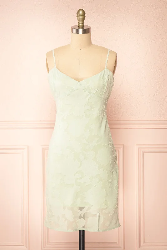Midi dresses with pom - pom trims for a playful and festive look Eliane Mint | Monochrome Short Dress w/ Floral Motif Midi dresses with pom - pom trims for a playful and festive look Eliane Mint | Monochrome Short Dress w/ Floral Motif