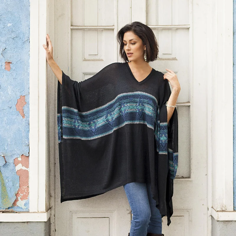 cable knit women cardigan with intricate patternsSeasonal Escape Artisan Crafted Cotton Blend Poncho in Black and Blue cable knit women cardigan with intricate patternsSeasonal Escape Artisan Crafted Cotton Blend Poncho in Black and Blue