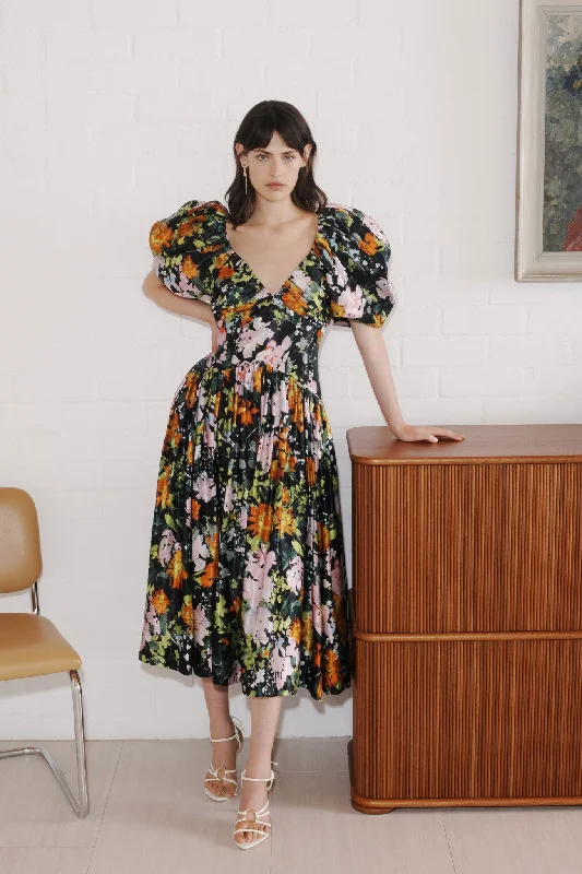 Midi dresses with geometric cutouts for a contemporary and edgy lookGabrielle Plunge Midi Dress Midi dresses with geometric cutouts for a contemporary and edgy lookGabrielle Plunge Midi Dress