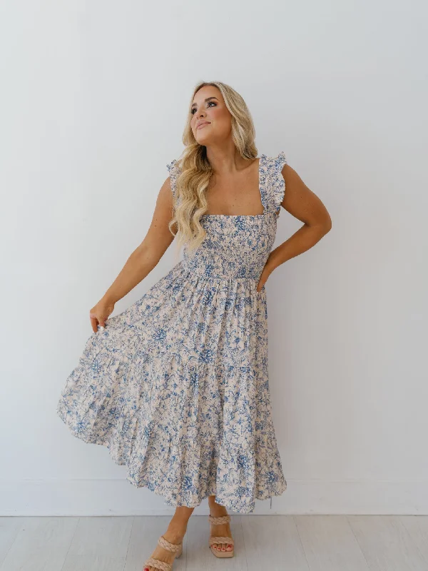 Midi dresses with embroidered accents for a unique and detailed designSienna Dress