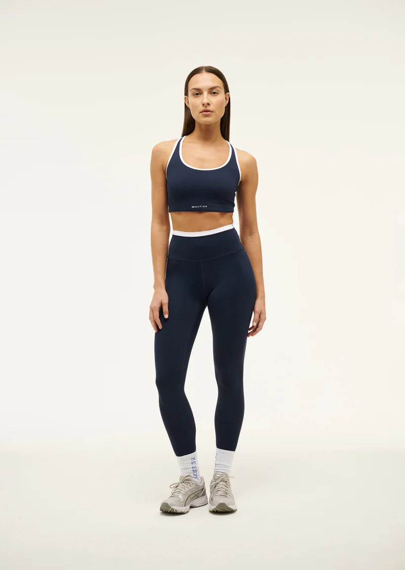 padded women sport bra for nipple coverageP.E. Nation Vita Full Length Legging - Black Iris/Optic White