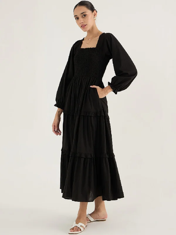 Maxi dresses with embroidered floral motifs for a unique designBlack Cotton Smocked Maxi Dress Maxi dresses with embroidered floral motifs for a unique designBlack Cotton Smocked Maxi Dress