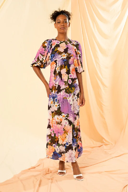 Maxi dresses with a ruched bodice for a more form - fitting and feminine shapeCaterina Maxi Dress Maxi dresses with a ruched bodice for a more form - fitting and feminine shapeCaterina Maxi Dress