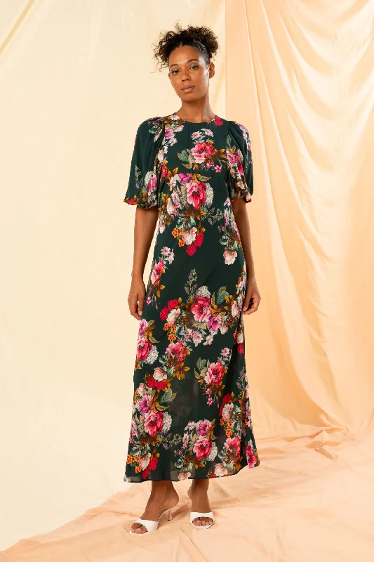 Maxi dresses with a gathered skirt for a voluminous and dramatic effectCarolina Puff Sleeve Maxi Dress Maxi dresses with a gathered skirt for a voluminous and dramatic effectCarolina Puff Sleeve Maxi Dress