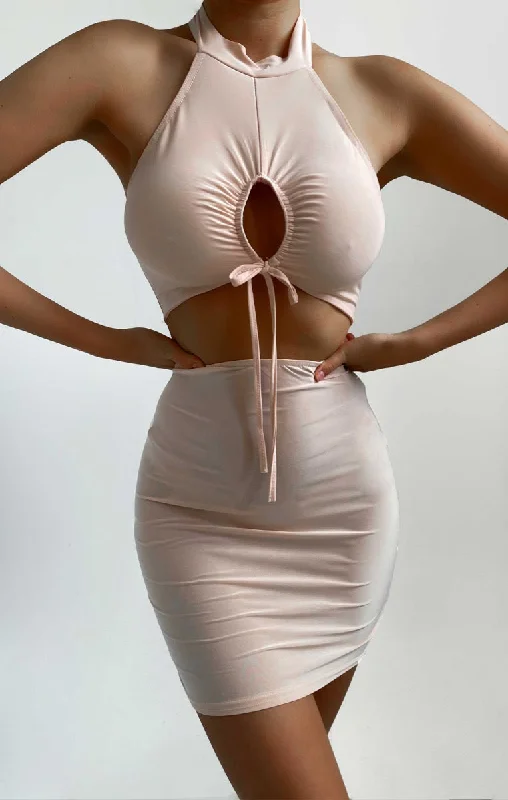 Mini dresses with criss - cross backs for a flirty lookNude High Neck Sleeveless Cut Out Ruched Bodycon Mini Dress - Osa Mini dresses with criss - cross backs for a flirty lookNude High Neck Sleeveless Cut Out Ruched Bodycon Mini Dress - Osa