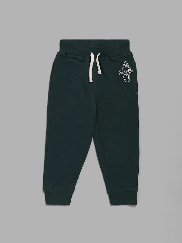 Ruffled Hem Women Shorts to Add a Feminine TouchHOP Kids Emerald Green Surfing Board Printed Joggers Ruffled Hem Women Shorts to Add a Feminine TouchHOP Kids Emerald Green Surfing Board Printed Joggers